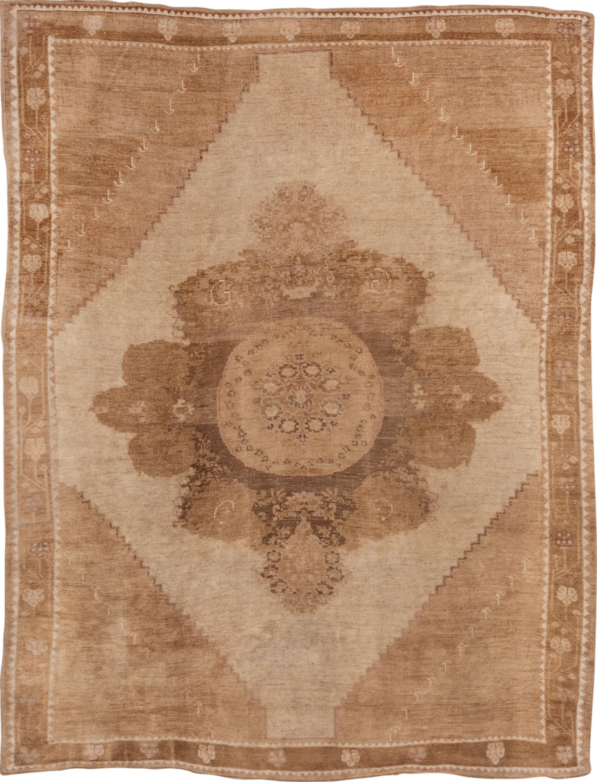 7' x 9' one-of-a-kind handmade vintage Oushak rug. Color palette: brown