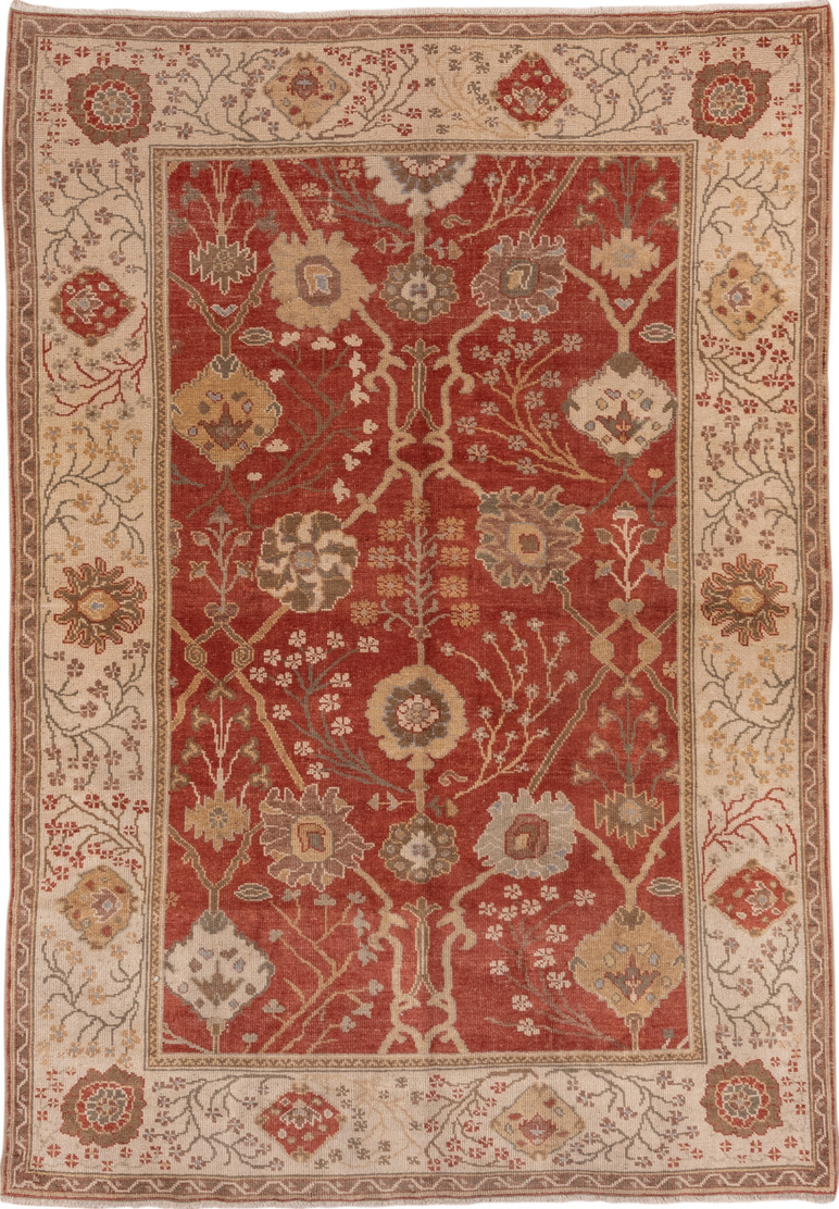 6' x 9' one-of-a-kind handmade vintage Oushak medium size rug. Color palette: brown, off-white, orange, pink