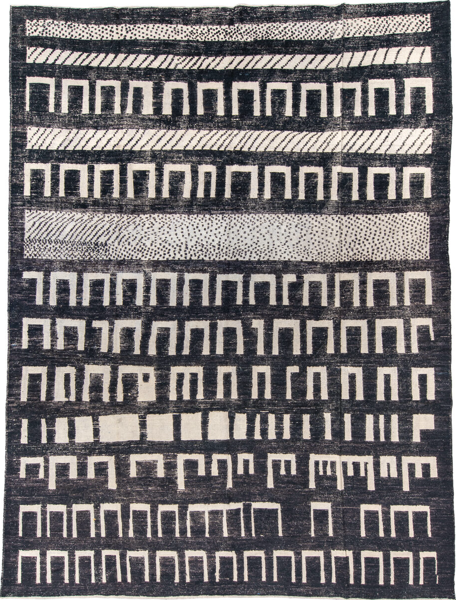9' x 12' one-of-a-kind handmade vintage Tulu large size rug. Color palette: gray, black, off-white, pink, light gray, blue