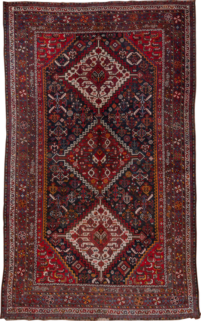 5' x 8' one-of-a-kind handmade vintage Shiraz medium size rug. Color palette: black, blue, brown, burgundy, gray, light gray