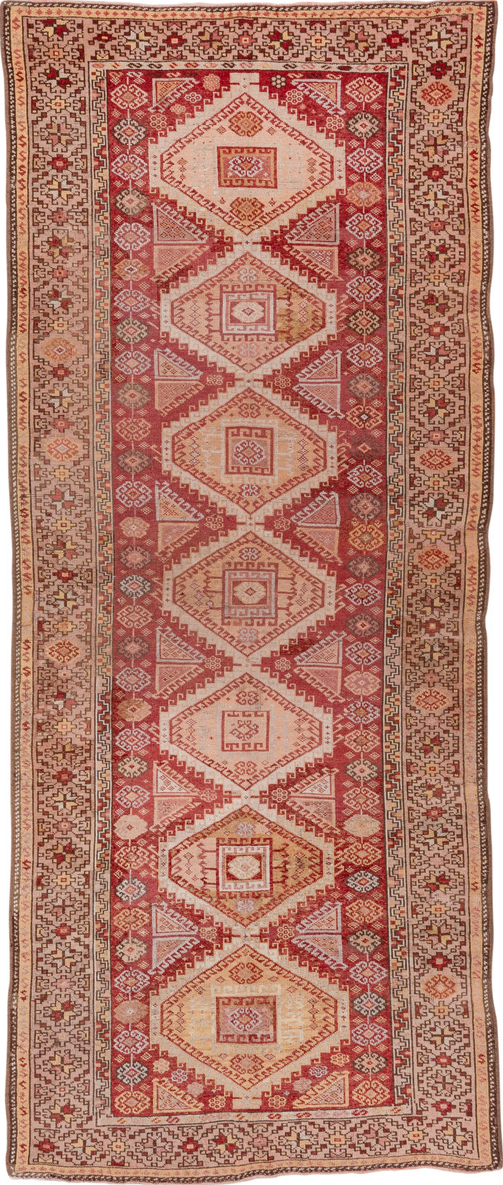 4' x 11' one-of-a-kind handmade vintage Kurd runner rug. Color palette: brown, pink, red
