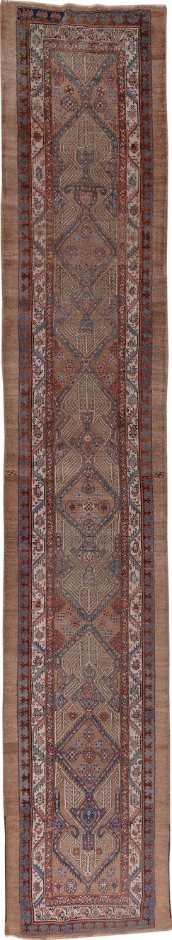 3' x 18' one-of-a-kind handmade vintage Serapi runner rug. Color palette: blue, brown, gray, off-white, pink, red, redwood