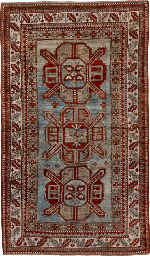 4' x 7' one-of-a-kind handmade vintage Kazak rug. Color palette: brown, gray, pink