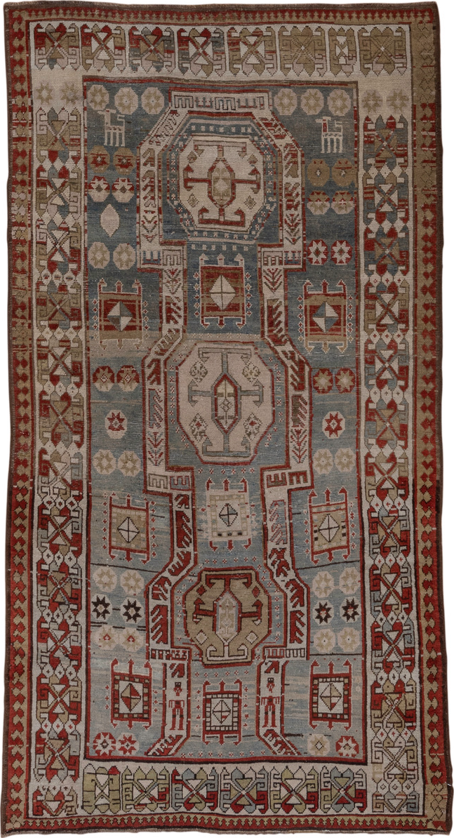 4' x 7' one-of-a-kind handmade vintage Kazak rug. Color palette: black, brown, dim gray, gray, red