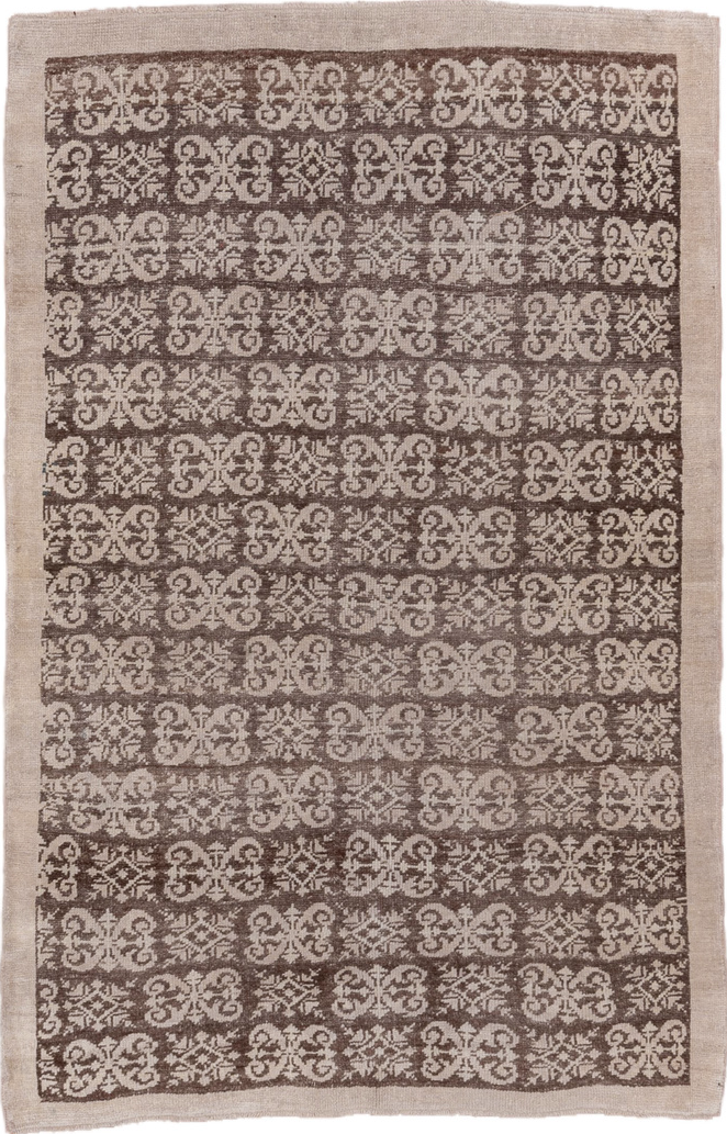 4' x 6' one-of-a-kind handmade vintage Tulu small size rug. Color palette: brown, gray, light gray, off-white, pink