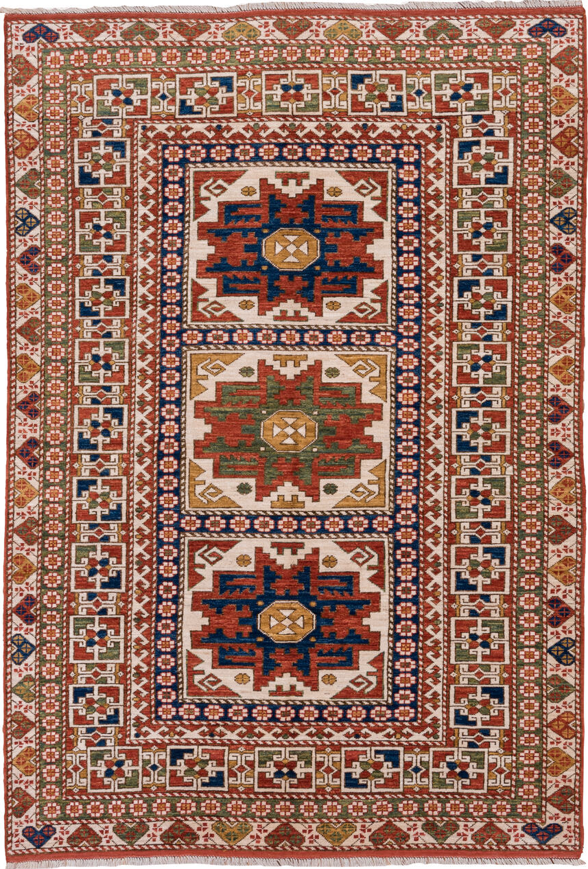 4' x 7' one-of-a-kind handmade vintage Kazak rug. Color palette: blue, brown, gray, light gray, misty rose, off-white
