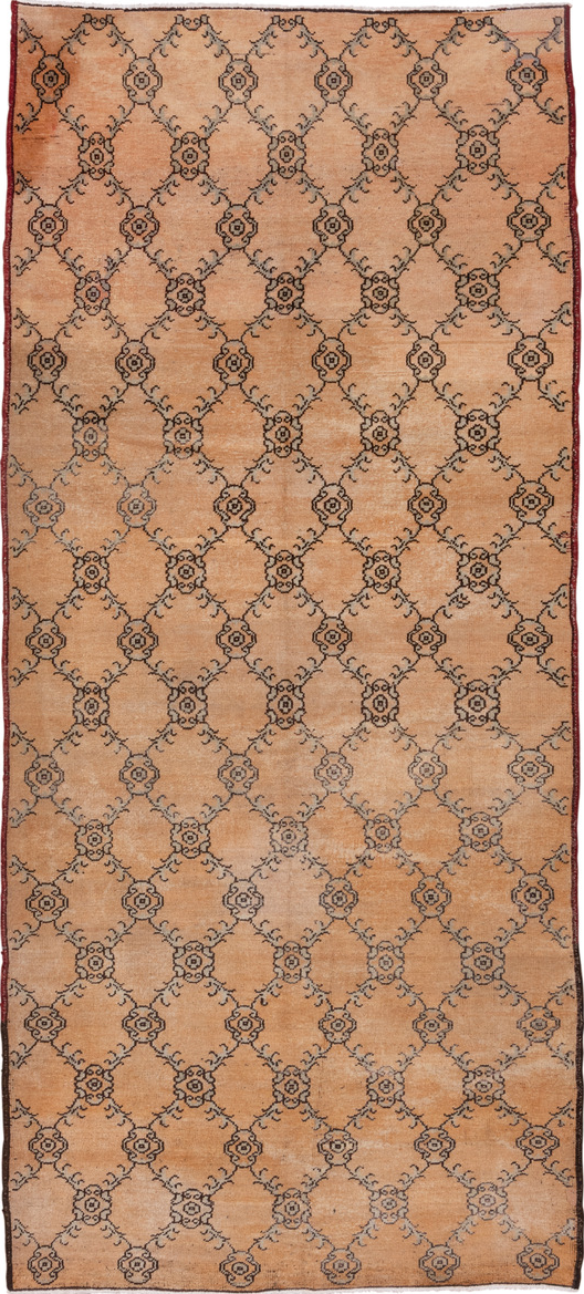 5' x 11' one-of-a-kind handmade vintage Konya runner rug. Color palette: brown, red, tan
