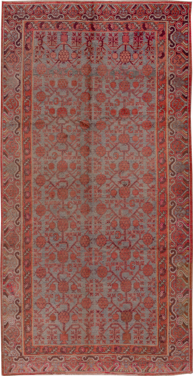 5' x 10' one-of-a-kind handmade vintage Khotan medium size rug. Color palette: brown, gray, pink, red, redwood