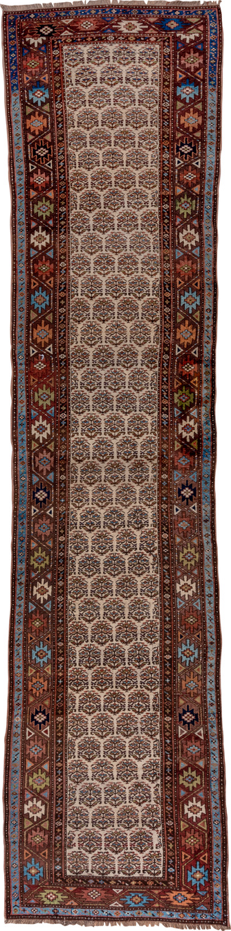 3' x 16' one-of-a-kind handmade vintage Kurd runner rug. Color palette: black, blue, brown, fiord, gray, pink, red