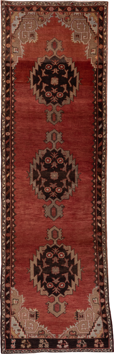 3' x 10' one-of-a-kind handmade vintage Oushak runner rug. Color palette: brown, gray, pink, red