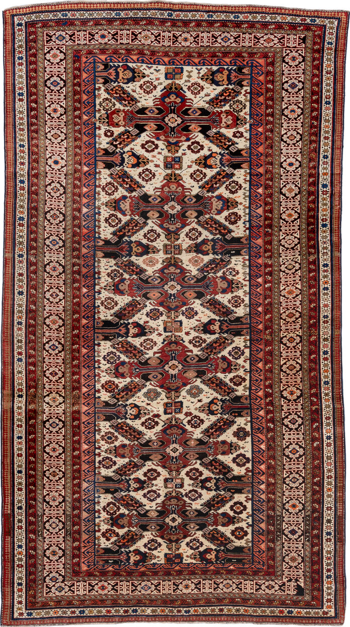 5' x 9' one-of-a-kind handmade vintage Caucasian medium size rug. Color palette: blue, brown, gray, light gray, off-white