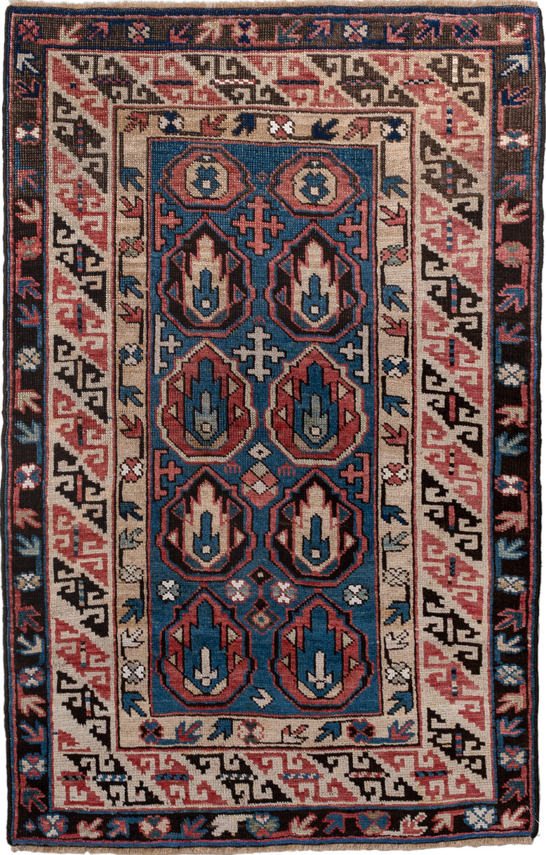2' x 4' one-of-a-kind handmade vintage Caucasian small size rug. Color palette: arapawa, black, blue, brown, gray