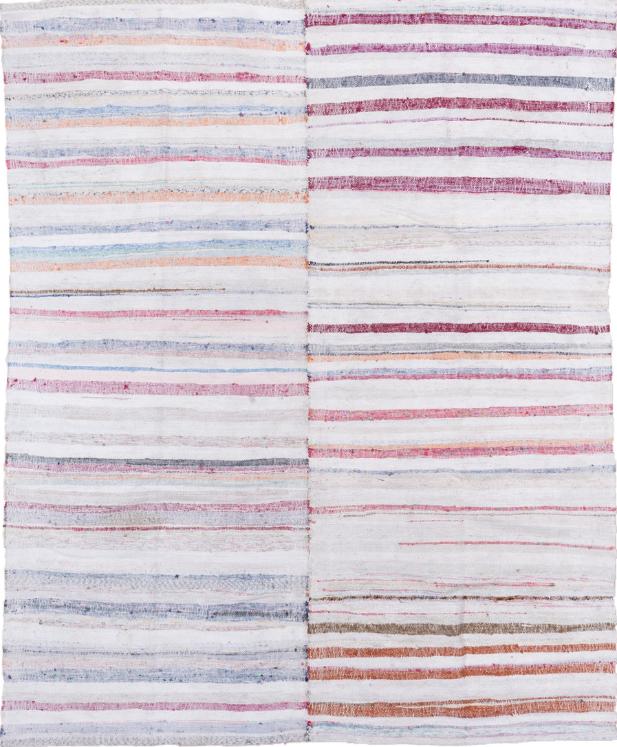 7' x 8' one-of-a-kind handmade vintage Rag Rug rug. Color palette: blue, gray, light blue, light gray, off-white, pink