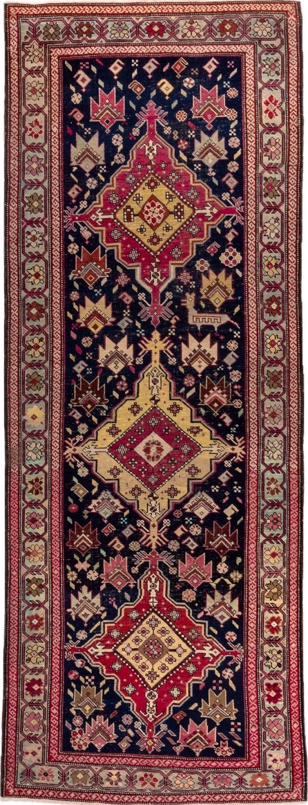 3' x 9' one-of-a-kind handmade vintage Karabagh runner rug. Color palette: black, brown, gray, orange, pink, red