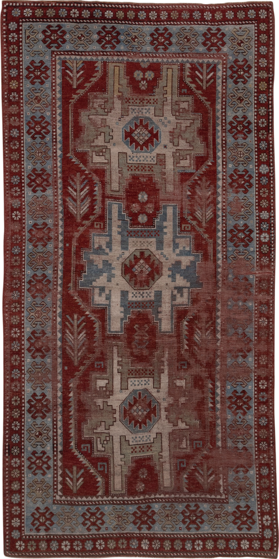 4' x 9' one-of-a-kind handmade vintage Kazak runner rug. Color palette: brown, dim gray, gray, light gray, pink, red
