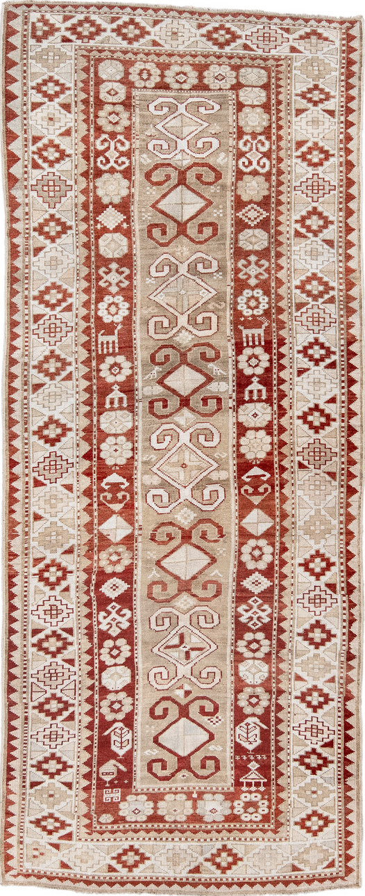 4' x 9' one-of-a-kind handmade vintage Caucasian runner rug. Color palette: brown, gray, light gray, off-white, orange, pink