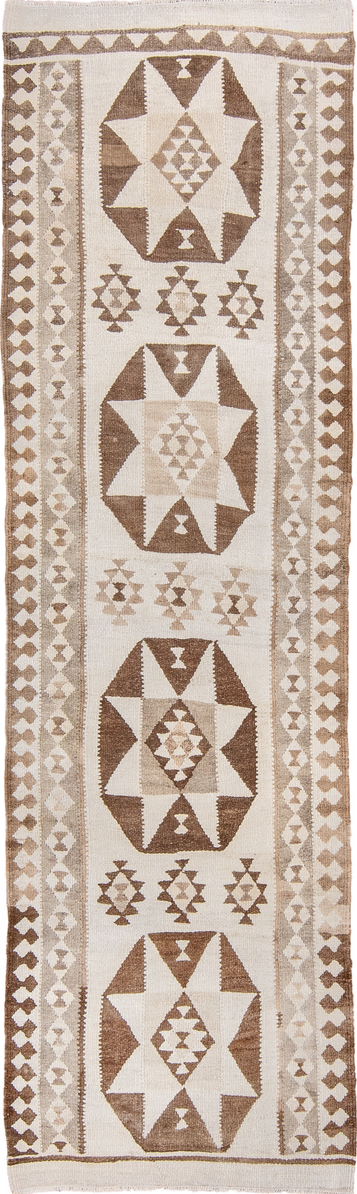 3' x 10' one-of-a-kind handmade vintage Kilim runner rug. Color palette: brown, gray, light gray, off-white, orange, pink