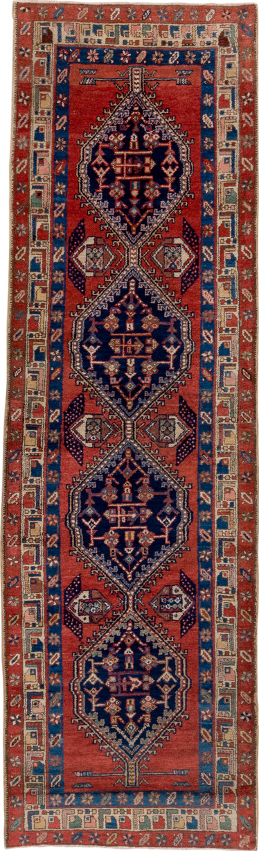 3' x 9' one-of-a-kind handmade vintage Heriz runner rug. Color palette: blue, brown, gray, maroon, pink, red, redwood