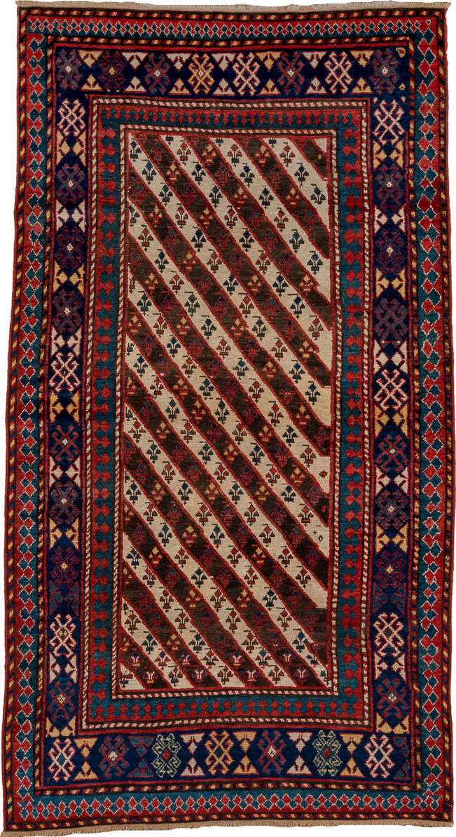 3' x 7' one-of-a-kind handmade vintage Kazak rug. Color palette: arapawa, black, blue, brown, charcoal, gray, pink, red
