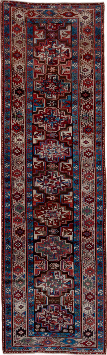 3' x 10' one-of-a-kind handmade vintage Kurd runner rug. Color palette: black, blue, brown, gray, pink, red