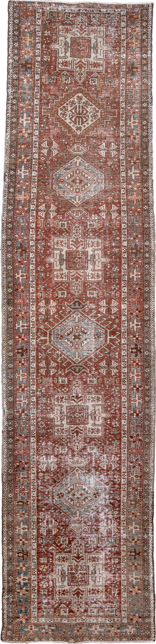 2' x 11' one-of-a-kind handmade vintage Karaje runner rug. Color palette: gray, light gray, pink, brown, off-white, red