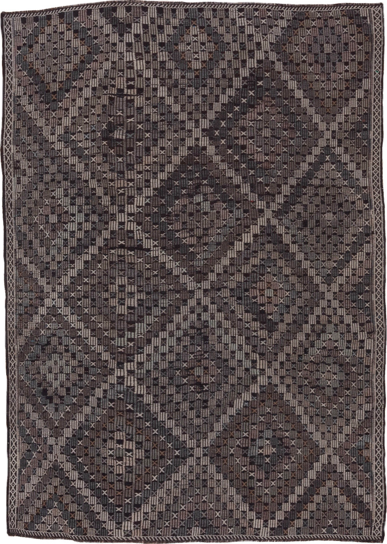 7' x 9' one-of-a-kind handmade vintage Jijim rug. Color palette: black, brown, charcoal, dark gray, dim gray, gray, pink