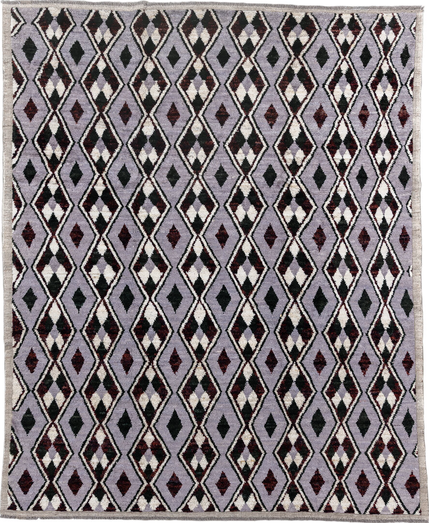 7' x 9' one-of-a-kind handmade vintage Tulu rug. Color palette: light gray, gray, off-white, black, brown, pink, red