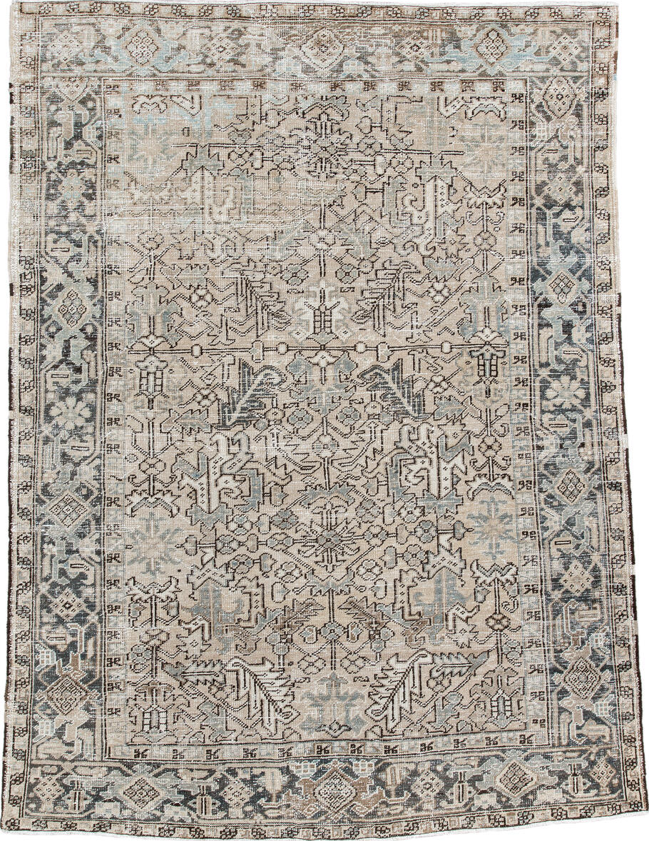 7' x 9' one-of-a-kind handmade vintage Heriz rug. Color palette: black, gray, light gray, off-white, pink