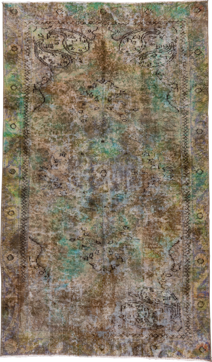5' x 9' one-of-a-kind handmade vintage Overdyed medium size rug. Color palette: brown, gray, light gray, off-white, silver