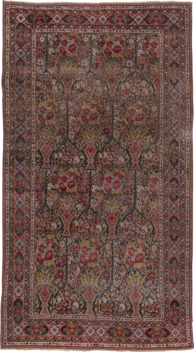 4' x 8' one-of-a-kind handmade vintage Agra rug. Color palette: brown, gray, pink, red