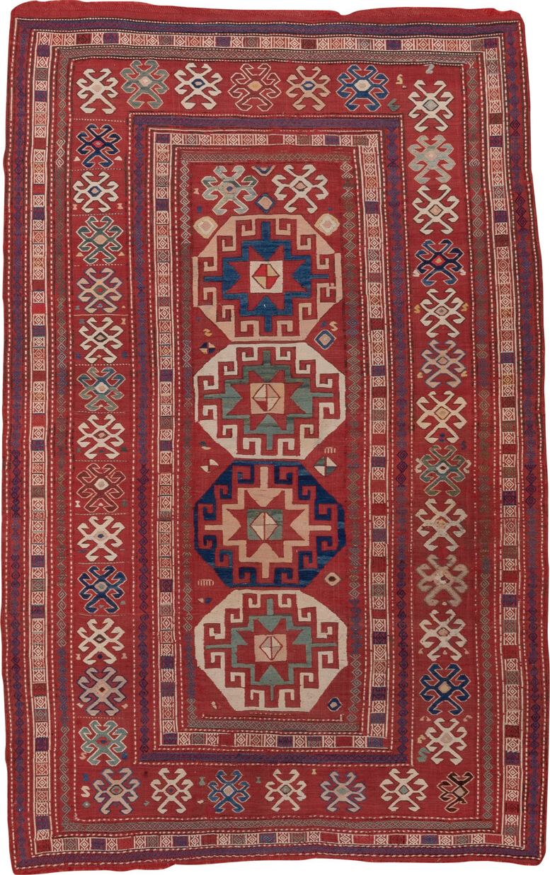5' x 8' one-of-a-kind handmade vintage Sumak medium size rug. Color palette: blue, brown, fiord, gray, pink, red