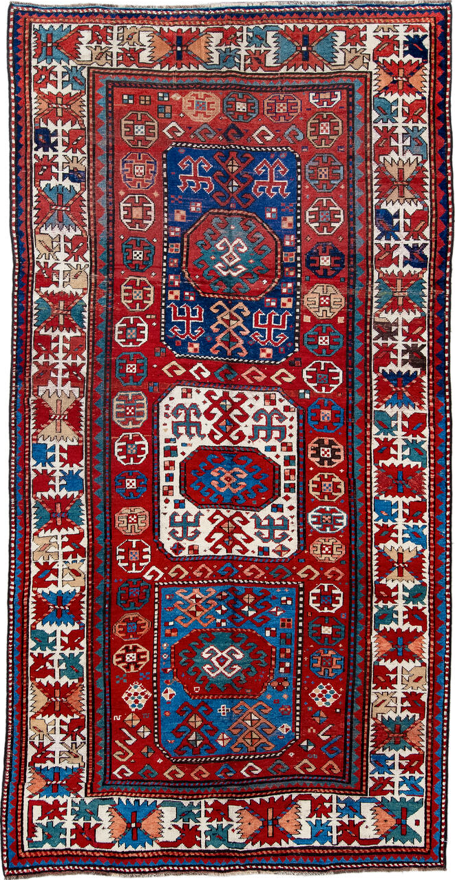 5' x 10' one-of-a-kind handmade vintage Kazak medium size rug. Color palette: arapawa, beige, black, blue, brown, burgundy