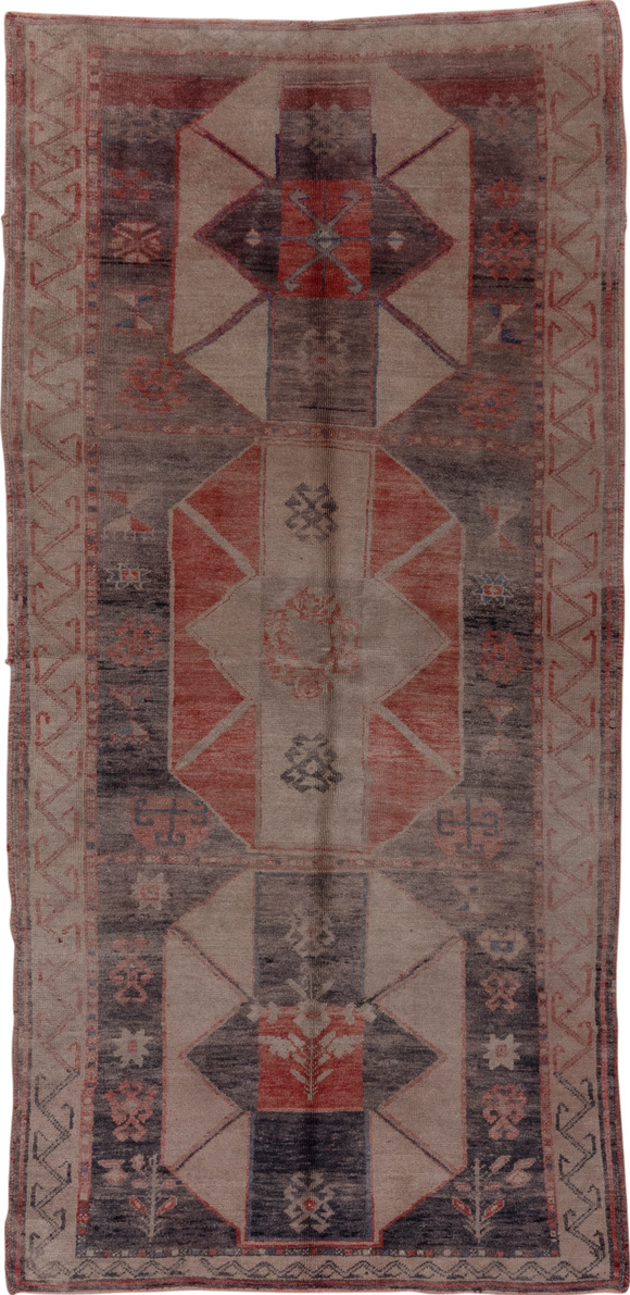 4' x 9' one-of-a-kind handmade vintage Oushak runner rug. Color palette: black, brown, charcoal, gray, pink, red, redwood