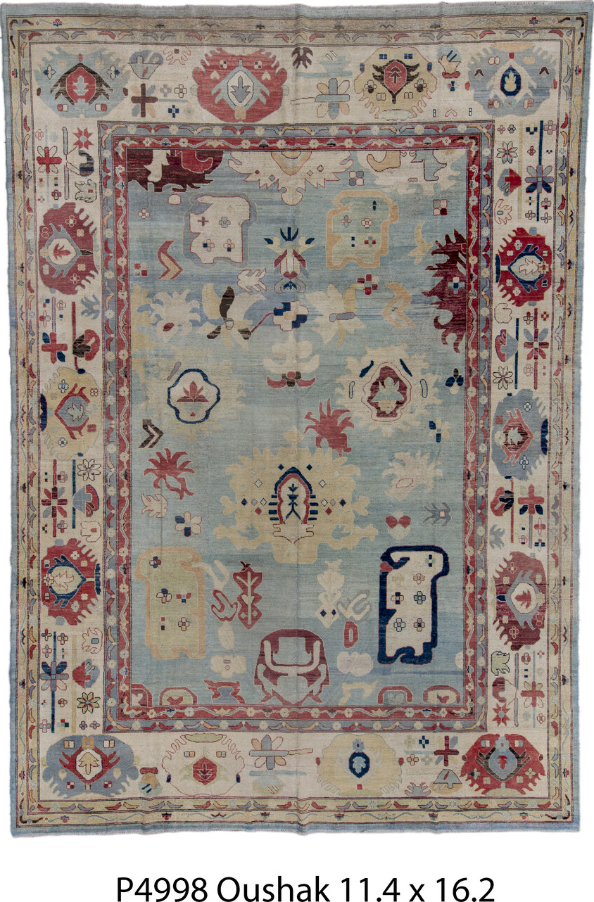 11' x 16' one-of-a-kind handmade vintage Oushak oversize rug. Color palette: blue, brown, gray, pink, red