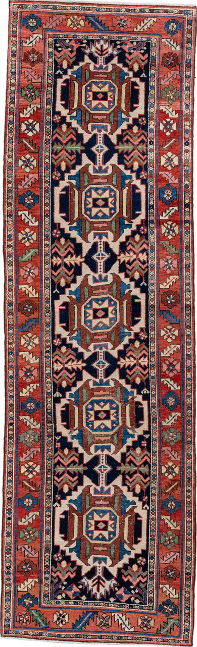 3' x 10' one-of-a-kind handmade vintage Karaje runner rug. Color palette: blue, brown, gray, light gray, off-white, pink