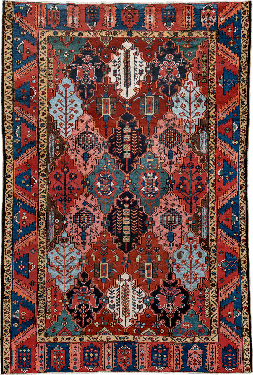 6' x 10' one-of-a-kind handmade vintage Baktiary large size rug. Color palette: black, blue, brown, burlywood