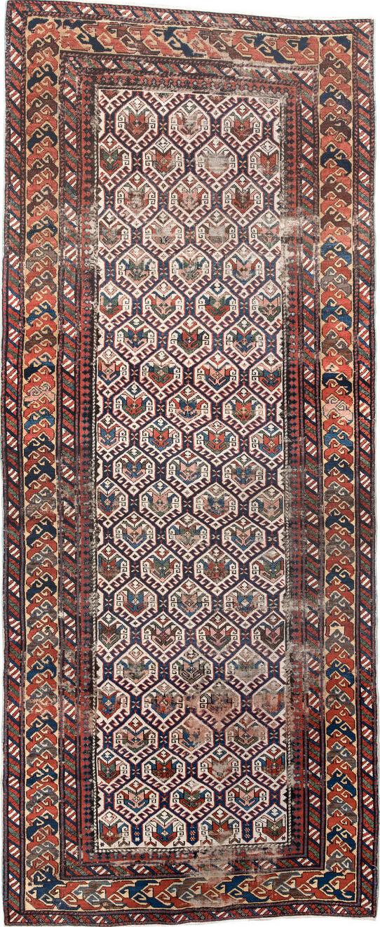 3' x 9' one-of-a-kind handmade vintage Shirvan runner rug. Color palette: pink, red, gray, blue, brown, off-white, yellow