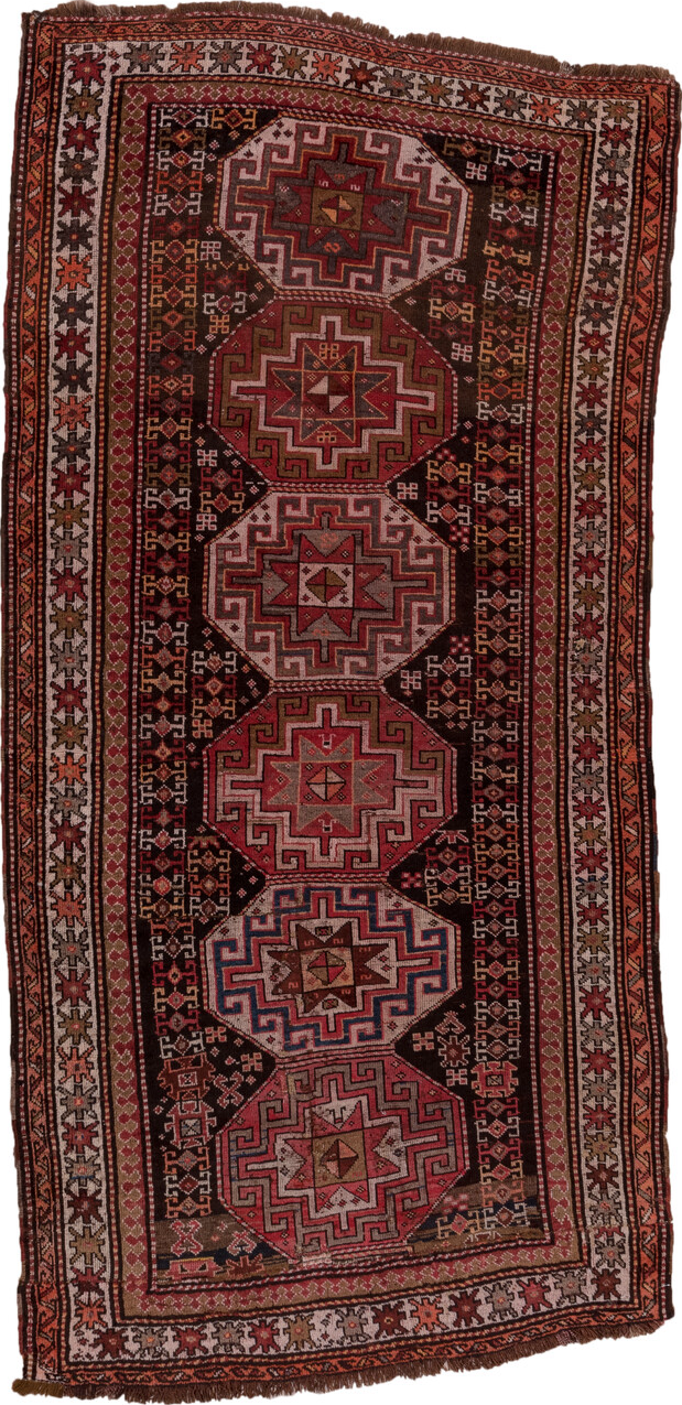 4' x 9' one-of-a-kind handmade vintage Kazak runner rug. Color palette: brown, gray, pink, red, rosy brown