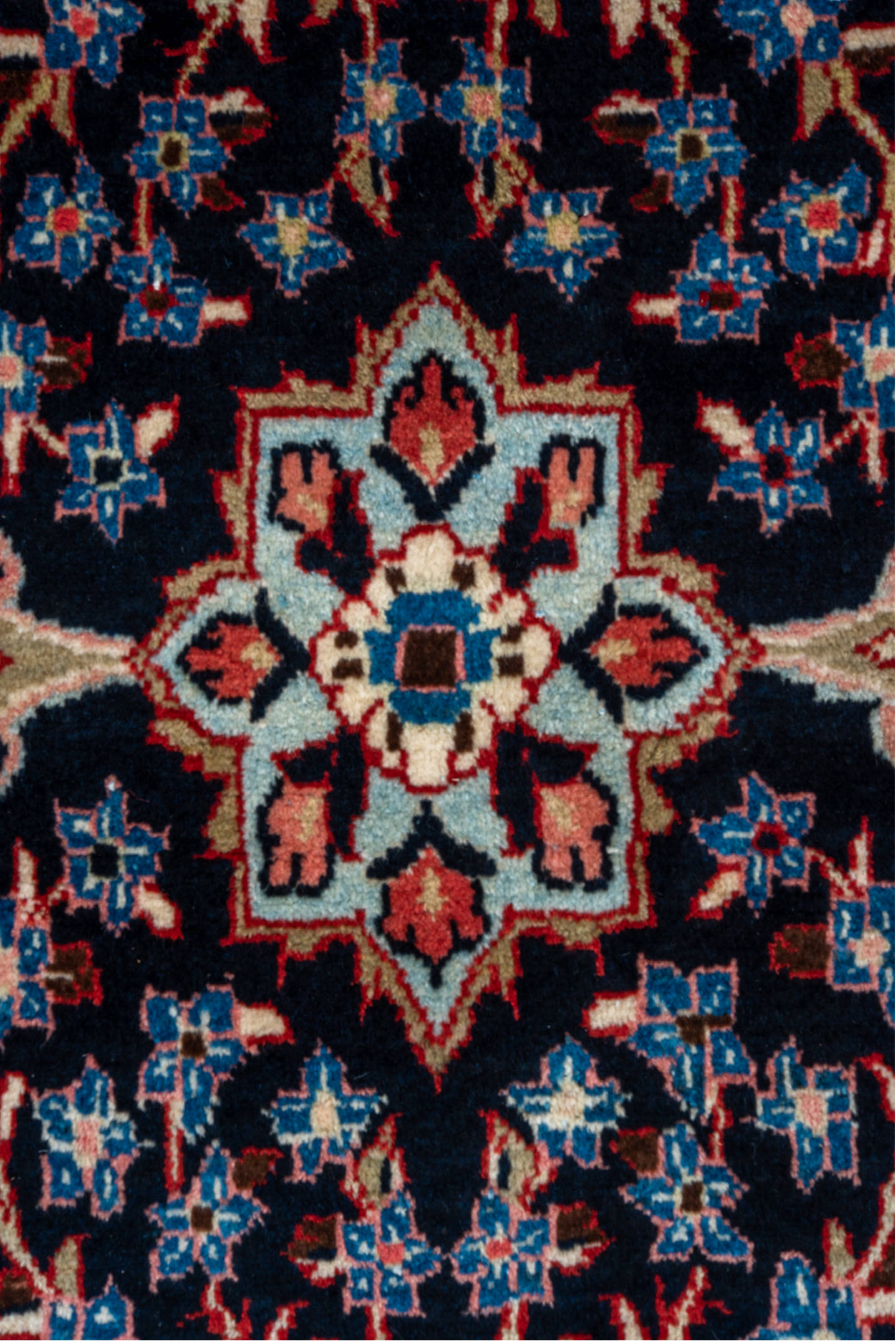 4' x 10' one-of-a-kind handmade vintage Mahal runner rug. Color palette: arapawa, black, blue, brown, gray, pink, red