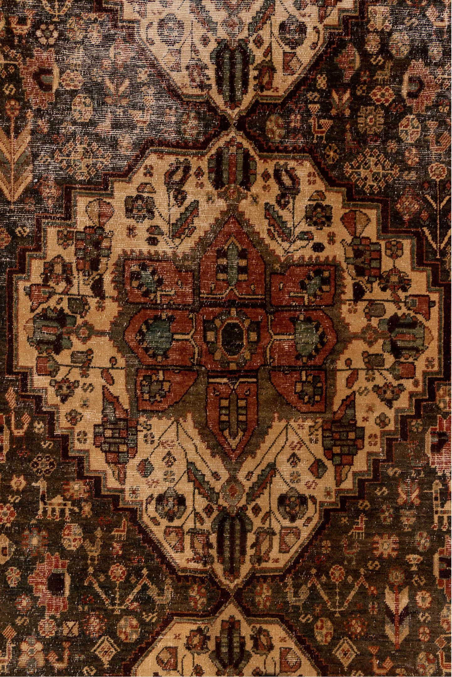 5' x 12' one-of-a-kind handmade vintage Baktiary rug. Color palette: brown, red