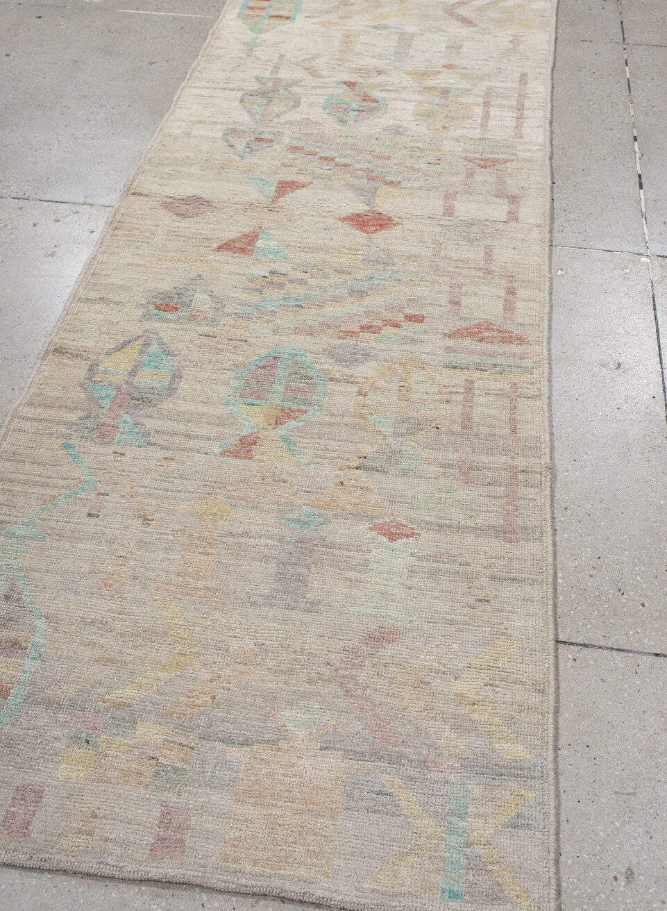 3' x 9' one-of-a-kind handmade vintage Tulu runner rug. Color palette: brown, gray, light gray, off-white, pink, silver