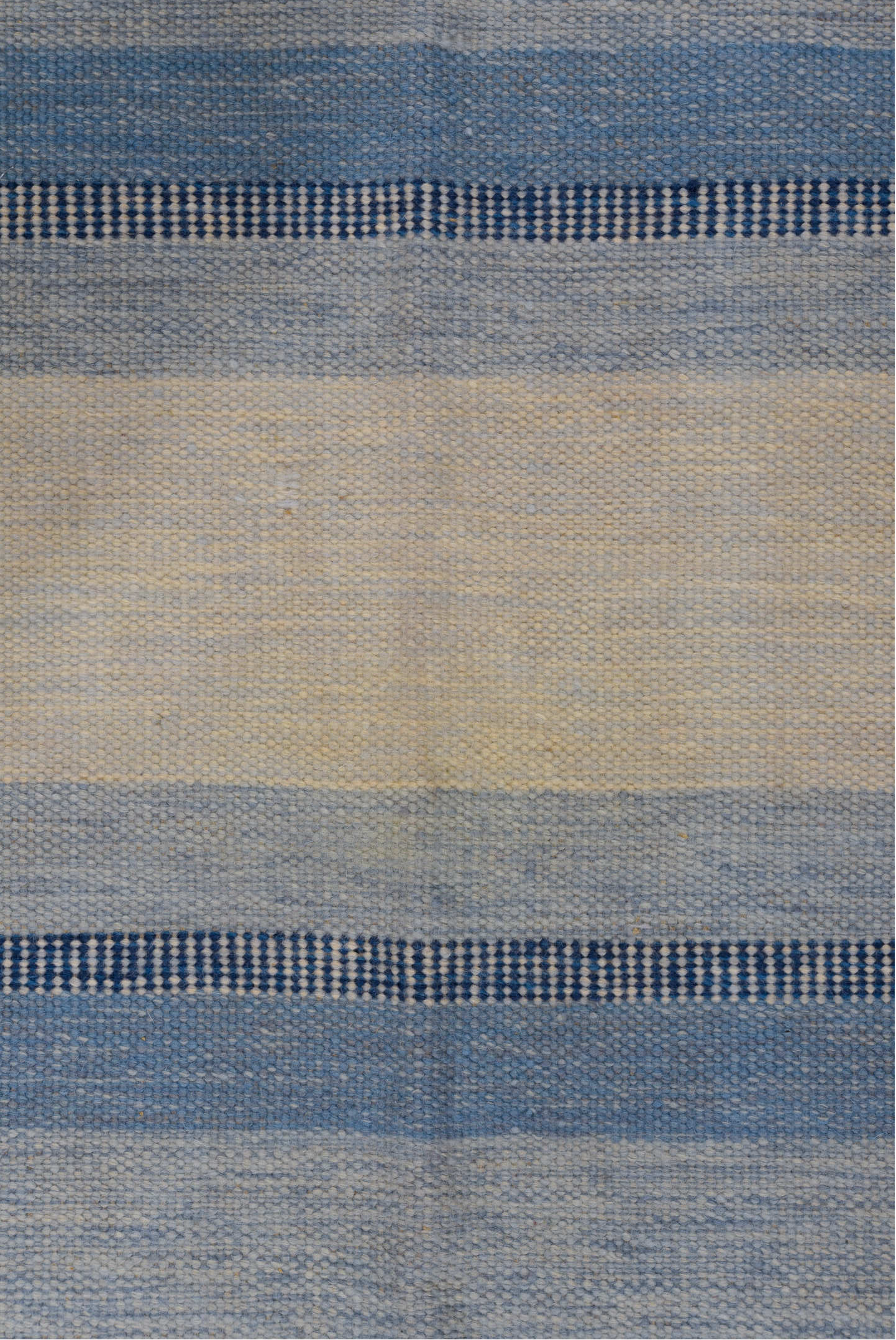 5' x 7' one-of-a-kind handmade vintage Rollaken rug. Color palette: black, blue, fiord, gray, light blue, light gray