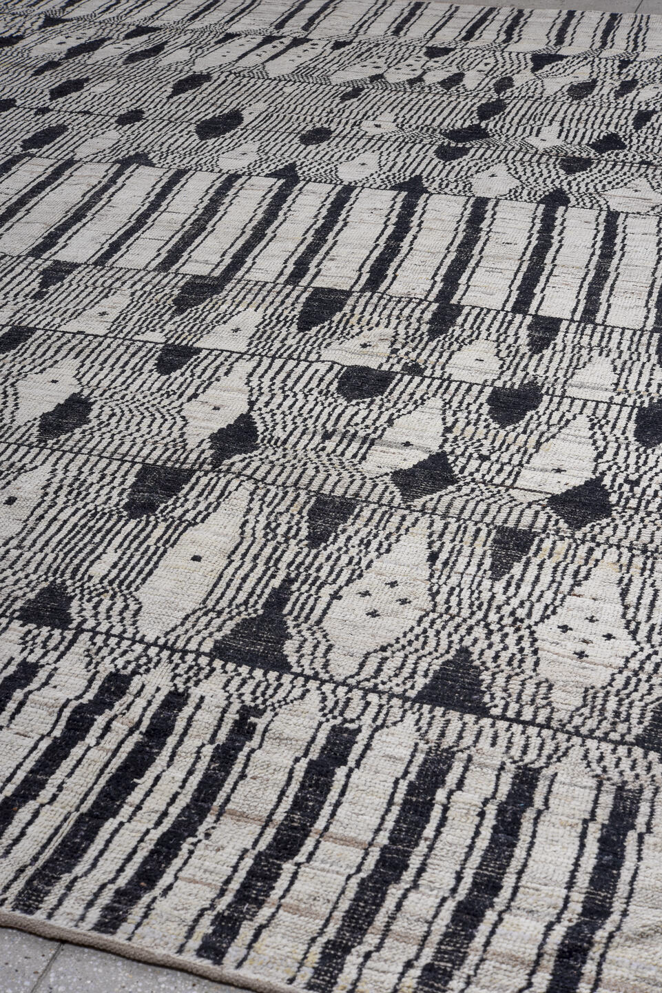 11' x 14' one-of-a-kind handmade vintage Tulu oversize rug. Color palette: black, blue, charcoal, dark gray, dim gray