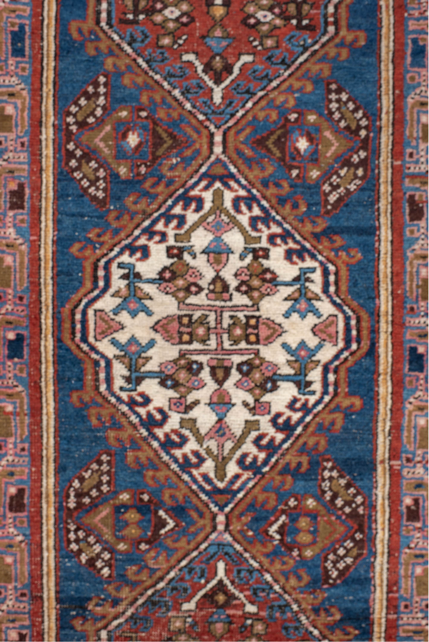 3' x 7' one-of-a-kind handmade vintage Sarab runner rug. Color palette: gray, blue, red, brown, black, pink, off-white