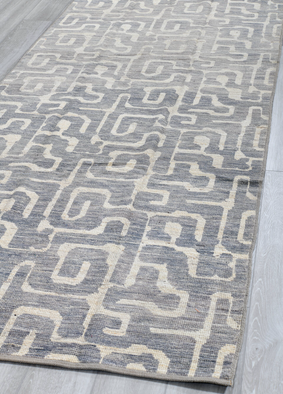 4' x 9' one-of-a-kind handmade vintage Tulu runner rug. Color palette: black, dark gray, dim gray, gainsboro, gray