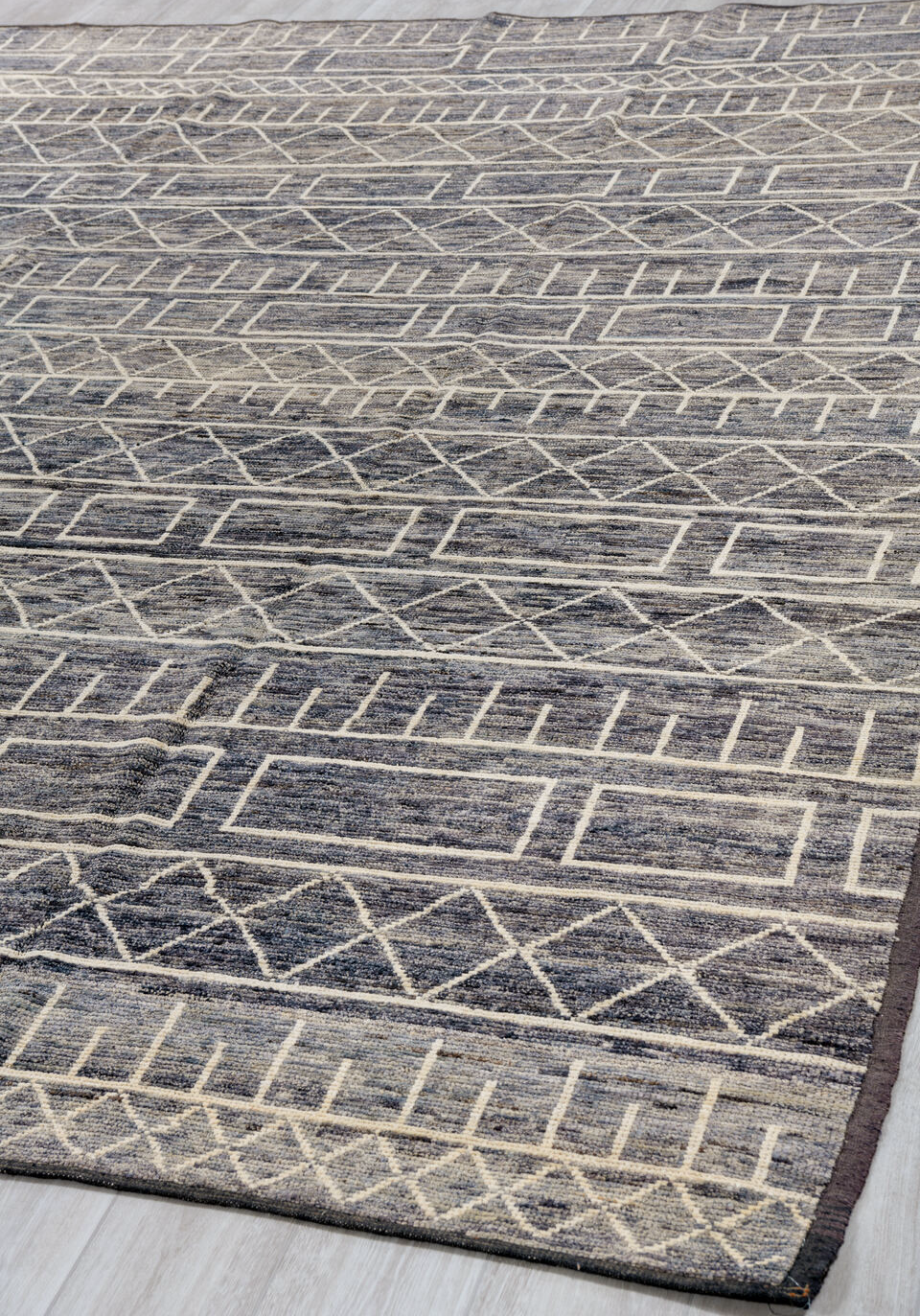 9' x 11' one-of-a-kind handmade vintage Tulu large size rug. Color palette: black, blue, brown, charcoal, dark gray