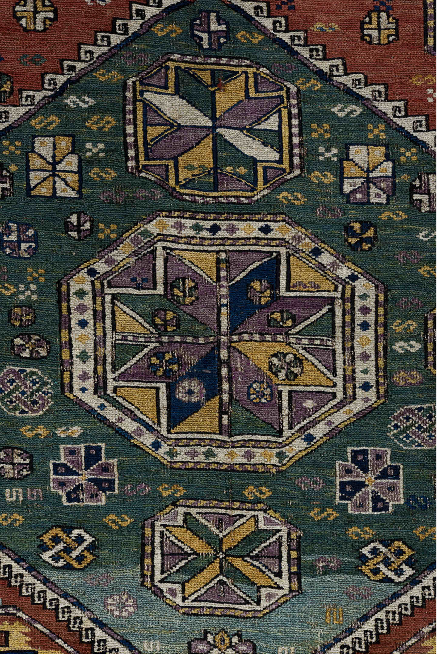 5' x 9' one-of-a-kind handmade vintage Sumak medium size rug. Color palette: gray, brown, light gray, off-white, blue, red