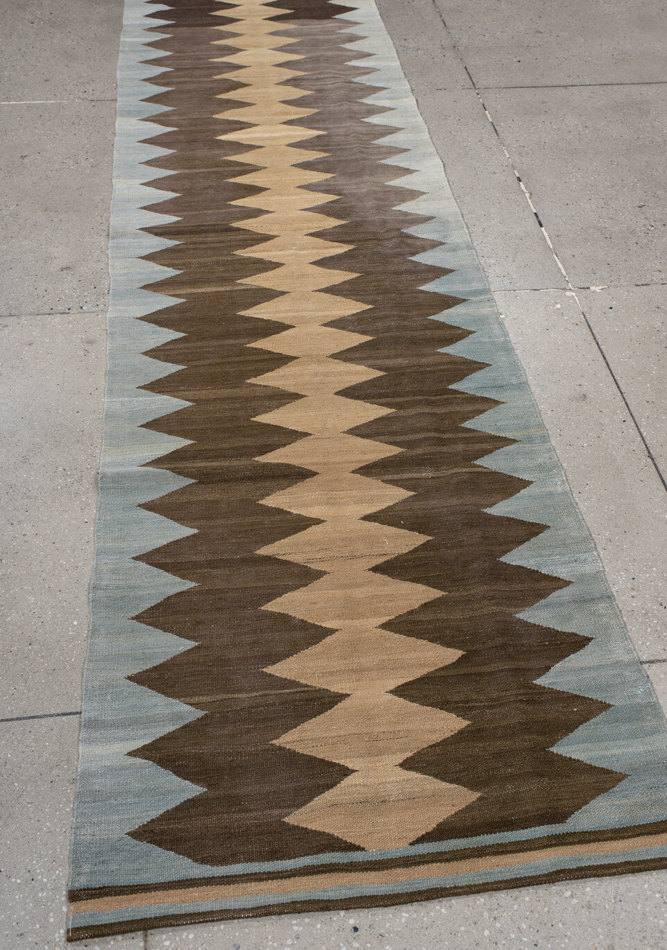 2' x 10' one-of-a-kind handmade vintage Kilim runner rug. Color palette: brown, dark gray, gray, light gray, orange, tan