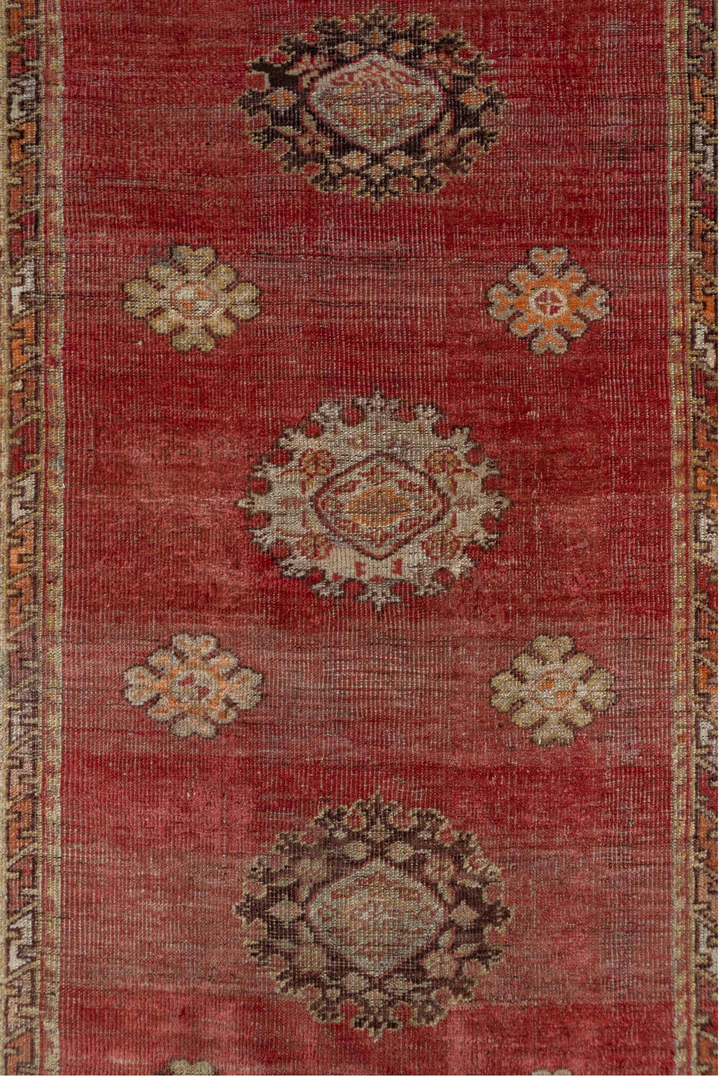 3' x 11' one-of-a-kind handmade vintage Oushak runner rug. Color palette: brown, orange, pink, red, redwood