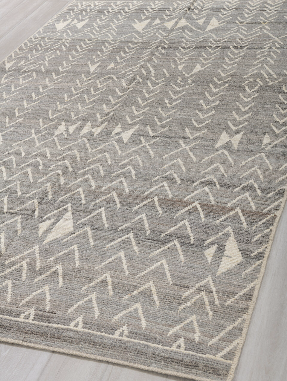 6' x 9' one-of-a-kind handmade vintage Tulu medium size rug. Color palette: dark gray, dim gray, gray, light gray, off-white